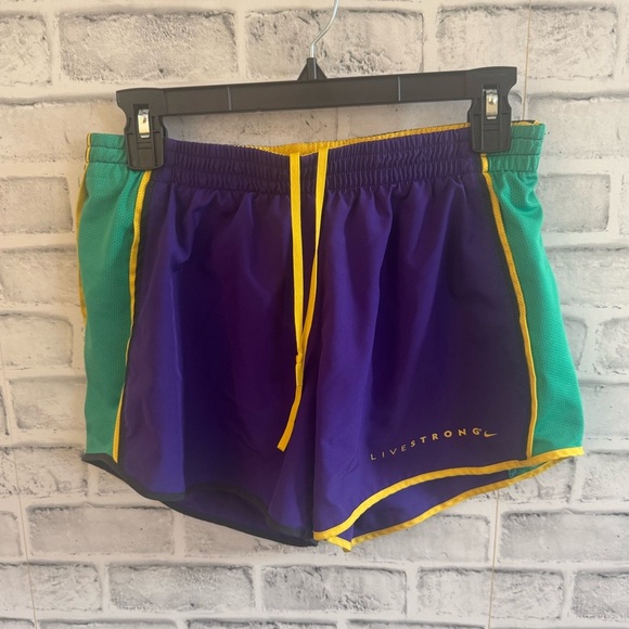 Women’s Dri-fit Nike Livestrong lined athletic shorts purple/green/yellow Small - Picture 1 of 4